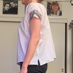Beautiful white top with colorful stitching